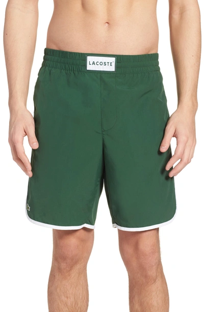 Shop Lacoste Side Stripe Swim Trunks In Green