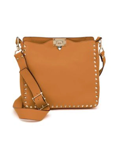 Shop Valentino Women's Small Rockstud Leather Hobo Bag In Cognac