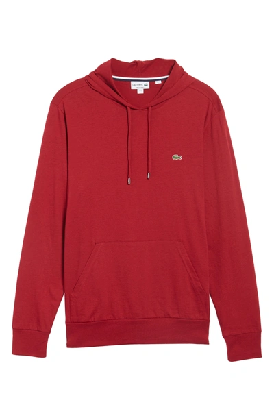 Shop Lacoste Pullover Hoodie In Turkey Red
