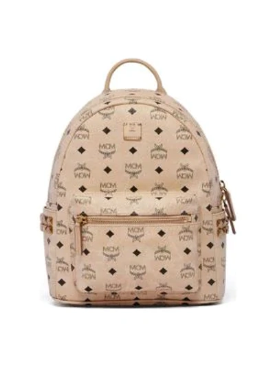 Shop Mcm Mini Stark Studded Coated Canvas Backpack In Beige