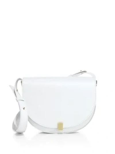 Shop Victoria Beckham Half Moon Leather Saddle Bag In White