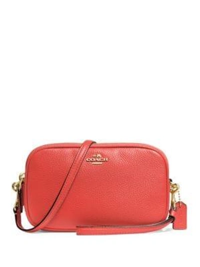 Shop Coach Pebble Leather Convertible Clutch In Deep Coral