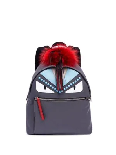 Shop Fendi Fur-detail Studded Monster Mini Backpack In Grey