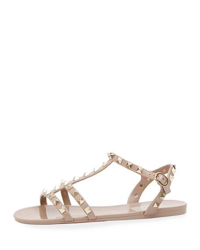 Shop Valentino Rockstud Jelly Flat Gladiator Sandals In Poudre