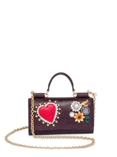 Shop Dolce & Gabbana Studded Leather Phone Bag In Wine