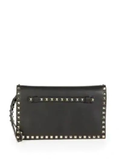 Shop Valentino Garavani Rockstud Leather Clutch In Black