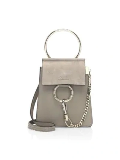 Shop Chloé Mini Faye Leather Bracelet Bag In Motty Grey