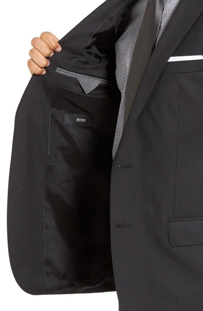 Shop Hugo Boss Huge/genius Trim Fit Wool Suit In Charcoal