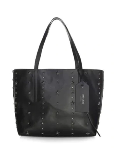 Shop Jimmy Choo Twist East West Star Studded Leather Tote In Black
