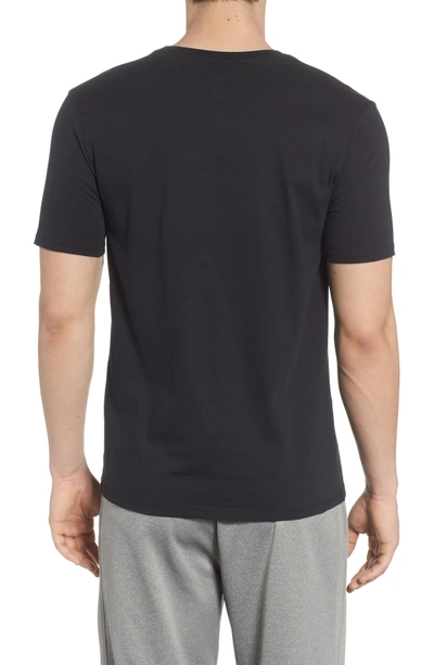 Shop Nike Sportswear Graphic T-shirt In Black