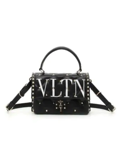 Shop Valentino Garavani Candystud Vltn Leather Top Handle Bag In Black