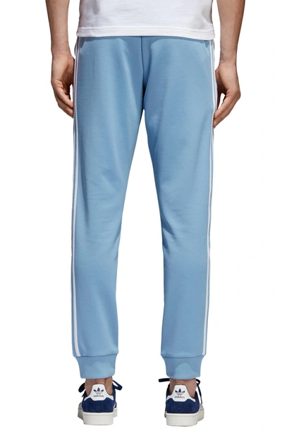 Shop Adidas Originals Sst Track Pants In Ash Blue