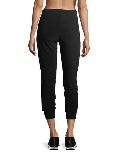 Shop Norma Kamali Pull-on Stretch-jersey Jogger Pants In Black