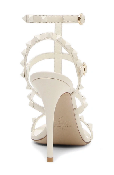 Shop Valentino Rockstud T-strap Sandal In Ivory/ Ivory