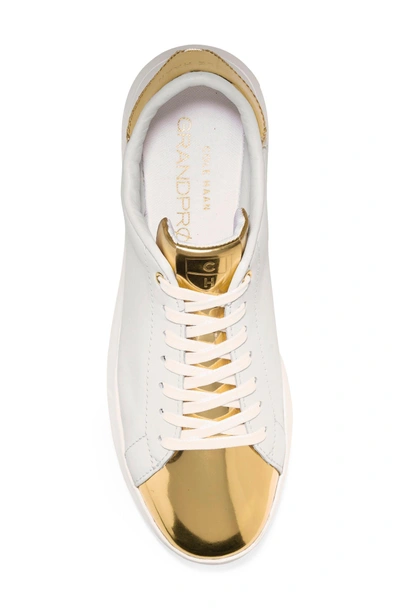 Shop Cole Haan Grandpro Tennis Shoe In Optic White/ Gold Leather