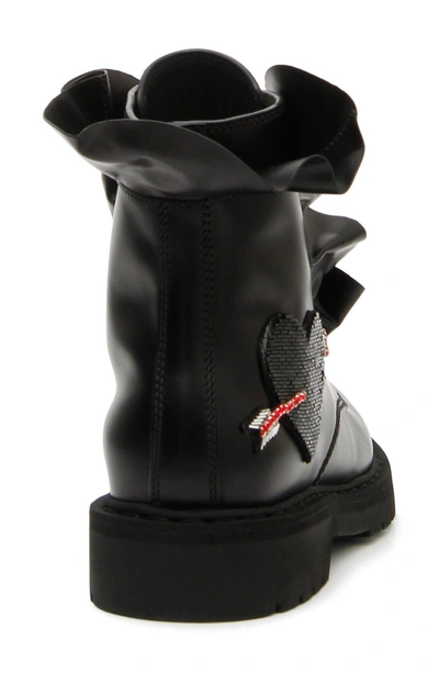 Shop Valentino Heart Ruffle Combat Boot In Black