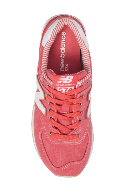 Shop New Balance 574 Sneaker In Coral