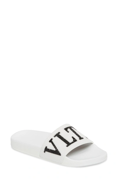 Shop Valentino Crystal Logo Slide Sandal In White