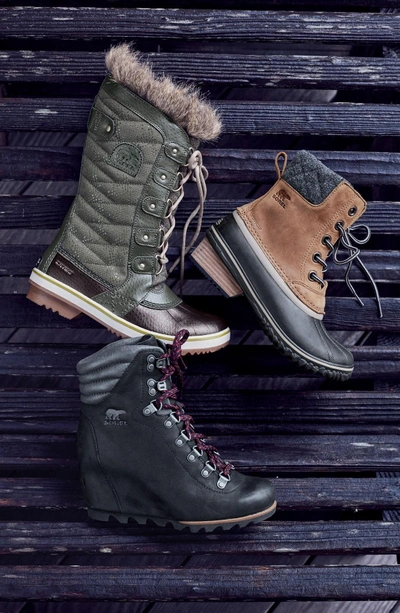 Shop Sorel 'conquest' Waterproof Wedge Boot In Beach/ Fawn