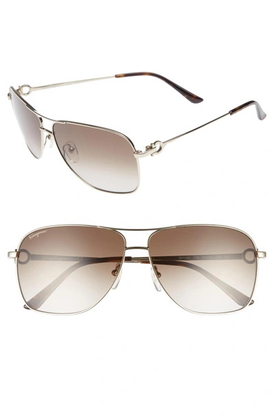 Shop Ferragamo Gancio 61mm Aviator Sunglasses In Shiny Gold