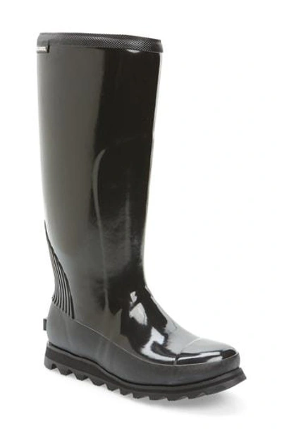 Shop Sorel Joan Glossy Tall Rain Boot In Black/ Sea Salt