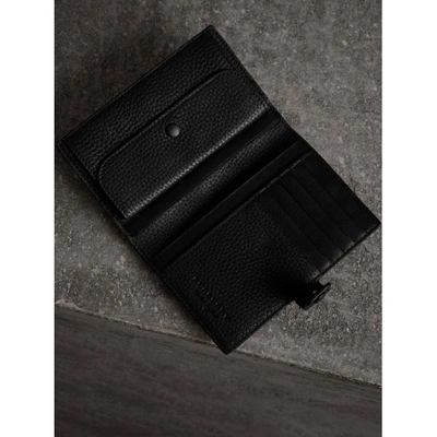 Shop Burberry Embossed Grainy Leather Folding Wallet In Black