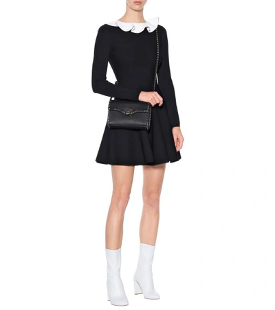 Shop Valentino Long-sleeved Knit Dress In Black