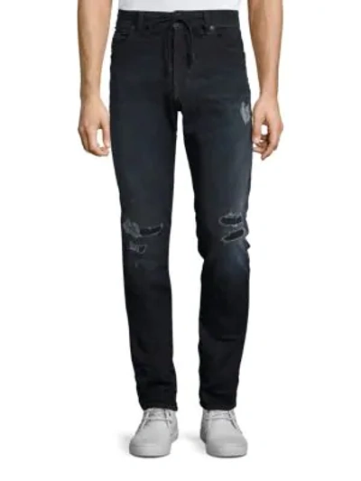 Shop Diesel Thavar Distressed Skinny-fit Jeans In Denim