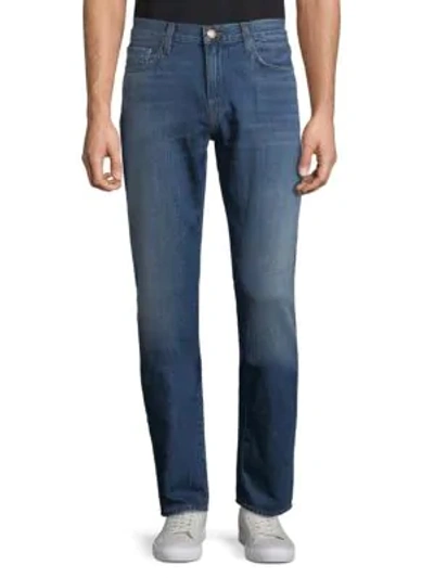 Shop J Brand Slim Faded Cotton Jeans In Blue