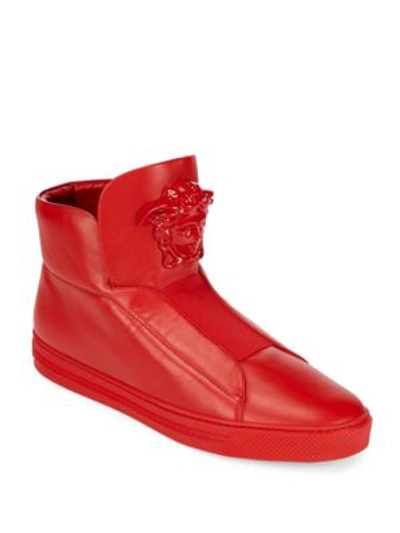 Shop Versace Solid Leather High-top Sneakers In Cardinal Red