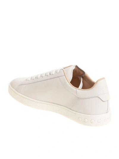 Shop Tod's Studded Logo Sneakers In White