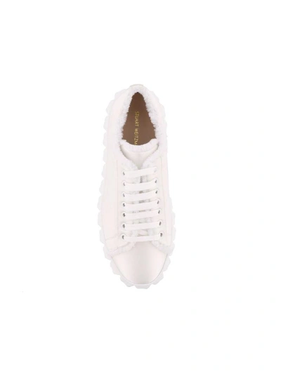 Shop Stuart Weitzman Fringie Sneakers In White