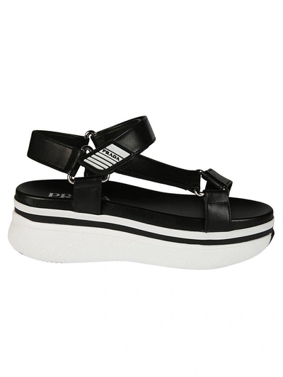 Shop Prada Branded Wedge Sandals In White Black
