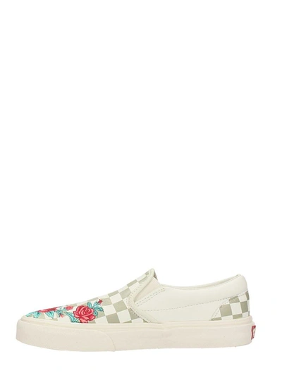 Shop Vans Classic Slip On Roses Sneakers In White