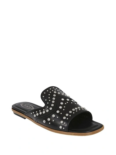Shop Tod's Studded Mules In Black