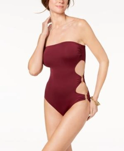 Shop Vince Camuto Cut-out Side Bandeau One-piece Swimsuit Women's Swimsuit In Red
