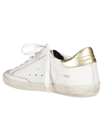 Shop Golden Goose Superstar Sneakers In White-gold