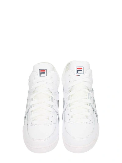 Shop Fila Wmns Cage Mid White Leather Sneakers