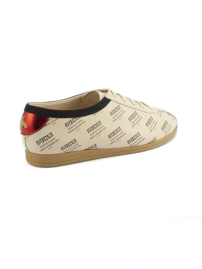 Shop Gucci Falacer  Invite Print Sneaker. In Beige