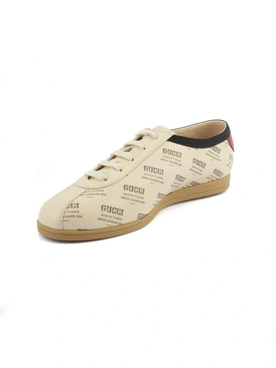 Shop Gucci Falacer  Invite Print Sneaker. In Beige