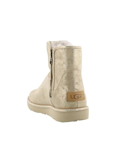 Shop Ugg Abree Mini Stardust Boots In Gold
