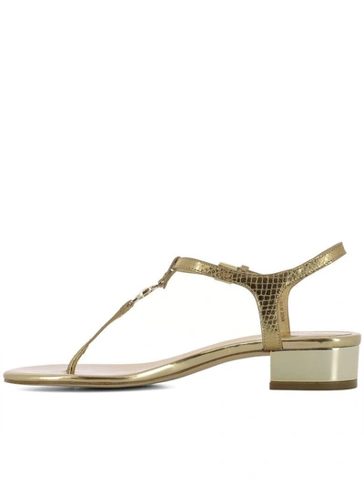 Shop Michael Kors Gold Leather Sandals