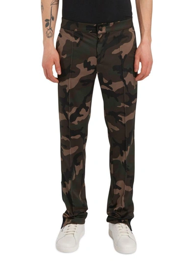 Shop Valentino Camouflage Trousers In Green