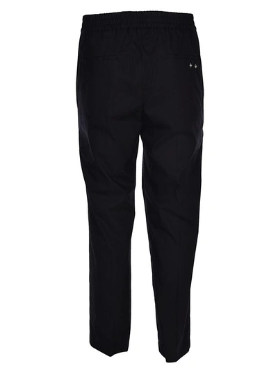 Shop Msgm Regular Fit Trousers In Black