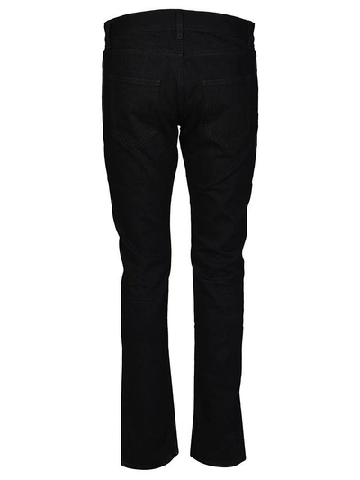 Shop Saint Laurent Slim Straight Trousers In Black