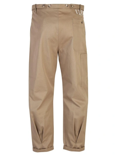 Shop Valentino Beige Pleated Trousers