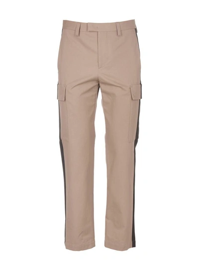 Shop Msgm Striped-detail Trousers In Beige