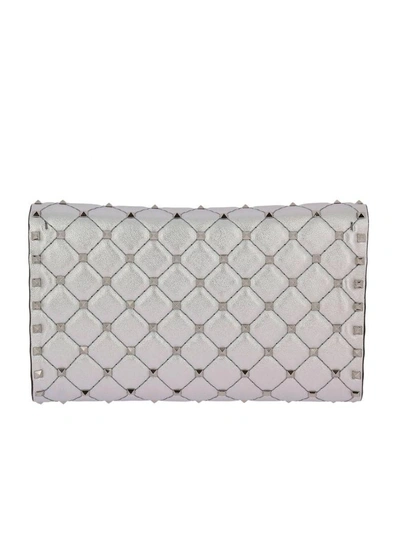 Shop Valentino Clutch  Rockstud Spike Small Bag In Laminated And Quilted Nappa Leather With Metal Studs An In Silver