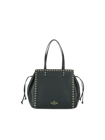 Shop Valentino Rockstud Hand Bag In Black