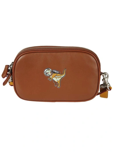 Shop Coach Dinosaur Shoulder Bag In Brown